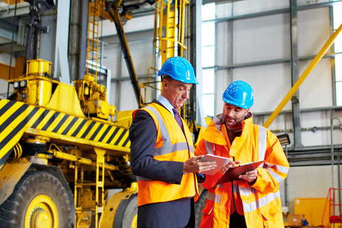 industrial building with two guys chatting