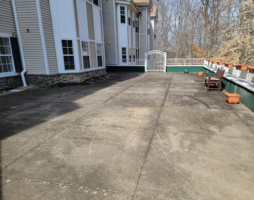 Before commercial pressure washing deck