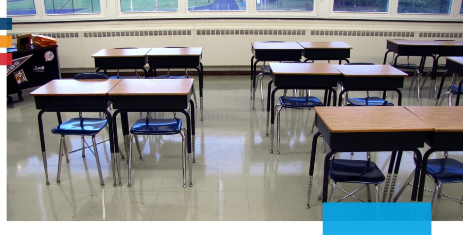 A clean classroom floor with rows of school desks. Floors are shining from commercial floor cleaning services.