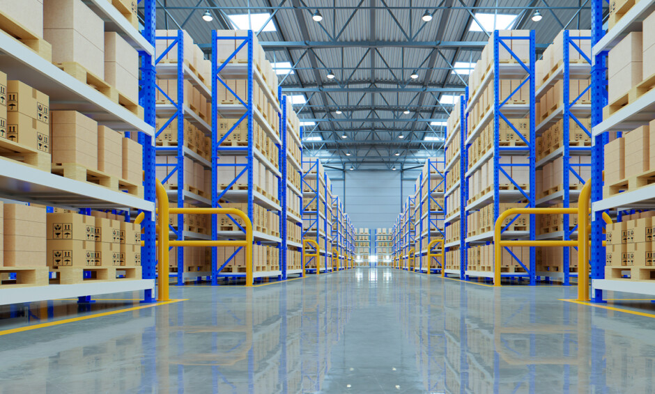 Warehouse with cleaned floors and stocked shelves and bright lighting